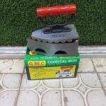 G.M.C. brand charcoal iron
