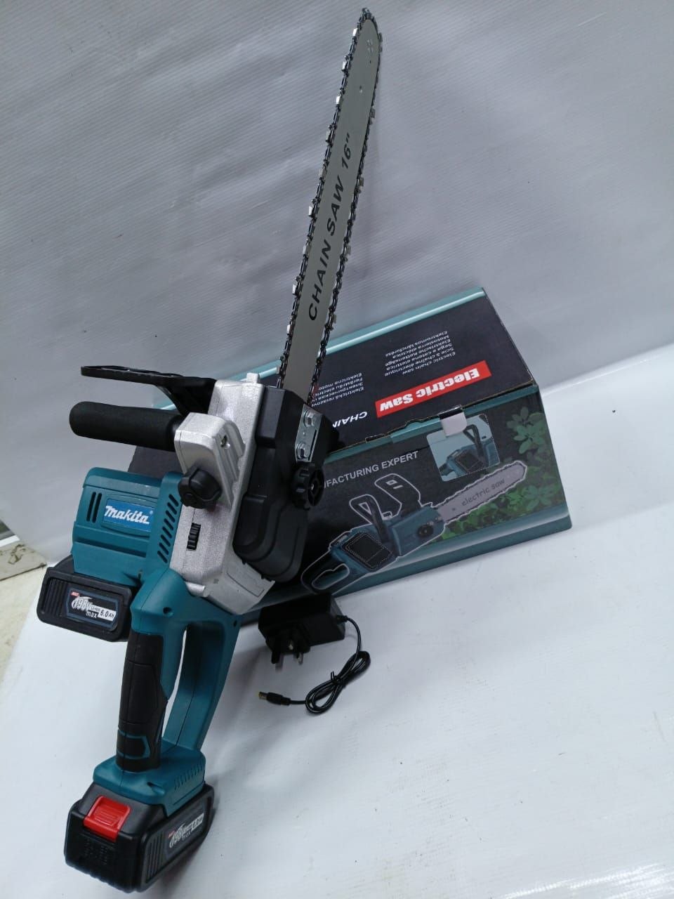 665b46c2-c3a9-4e62-94e1-d127ea0f5a83 Makita 16-inch cordless electric power saw 198V - Image 1